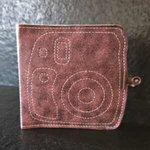 Structure d'album polaroid rose tacheté